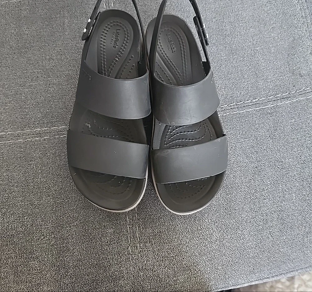 Crocs Brooklyn Low Wedge Sandal In Black And Tan